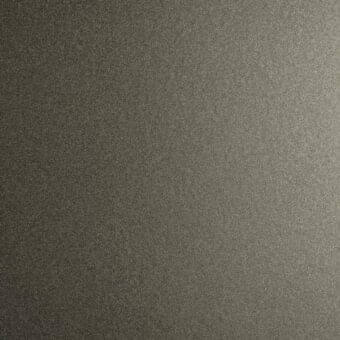 Titanium embossed metal texture, matte gray finish, granular surface with tonal gradient, industrial material sample.